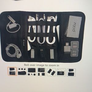 NWOT Patu black roll up bag. Perfect for electronics, cosmetics . Many pockets